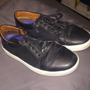 Men Black Allen Edmonds sneakers.